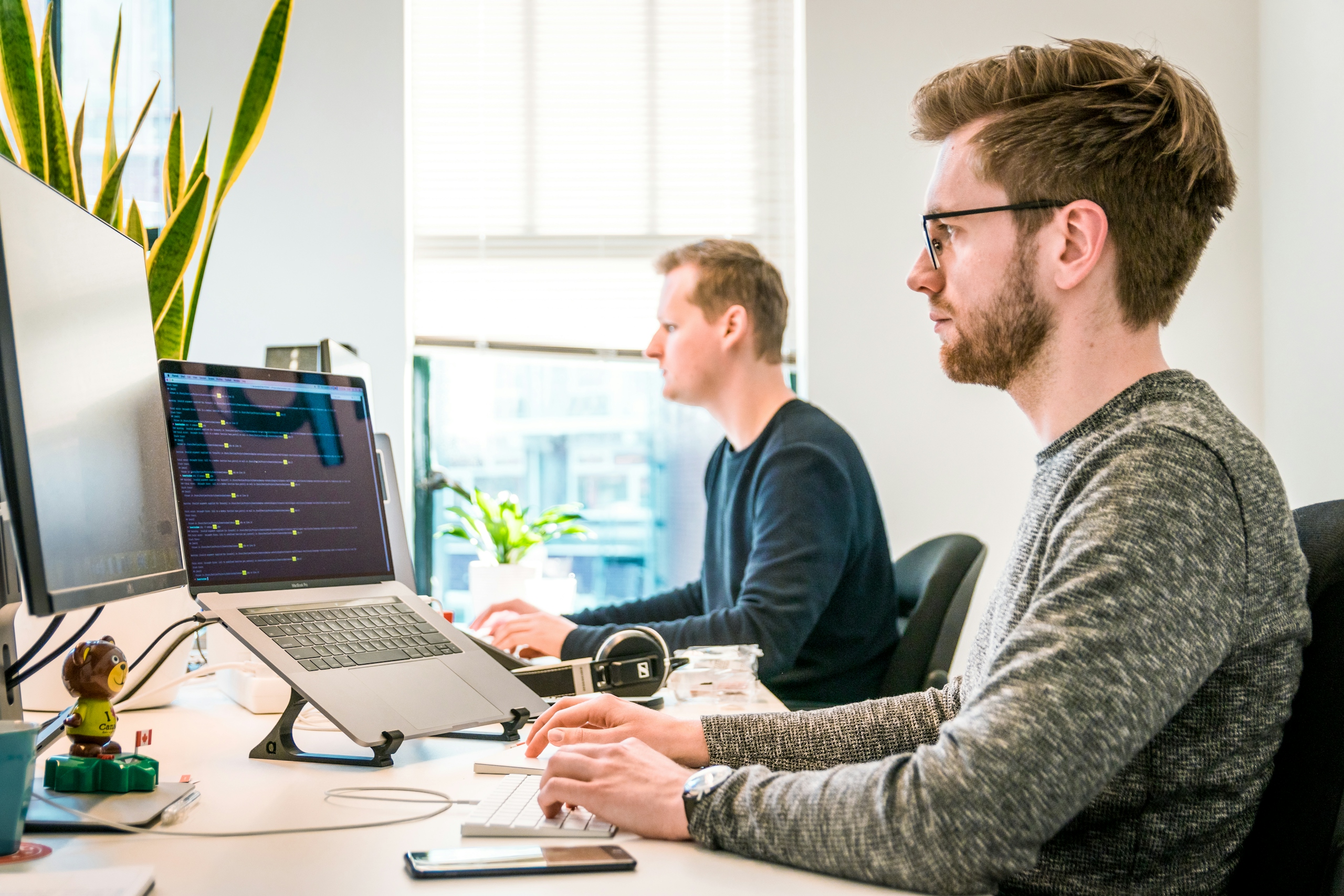 Developers and designers at workstations